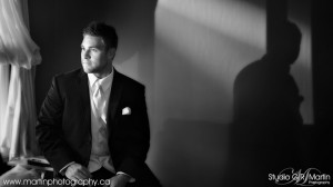 Black and white portrait of a groom getting ready - wedding photography